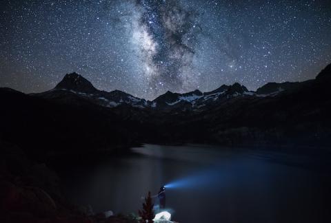 Stars over a mountain lake
